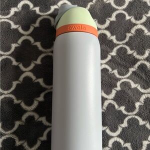 Owala Sky Water Bottle with Mint and Coral Accents
